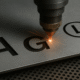 Laser Cutting Plat Besi Bentuk Huruf dan Logo di Jatiuwung